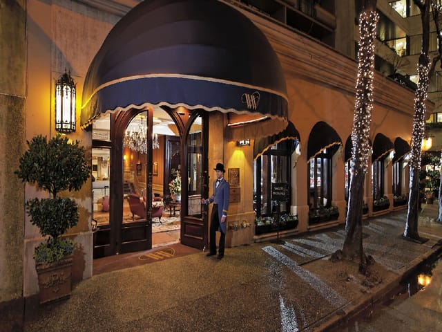 Lavish Wedgewood Hotel entrance with doorman, perfect for upscale events and gatherings.