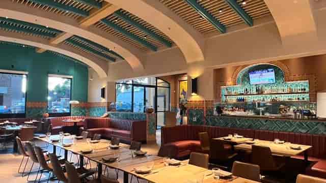 Willow Room at Copita: modern event space with natural light, ideal for meetings and networking.