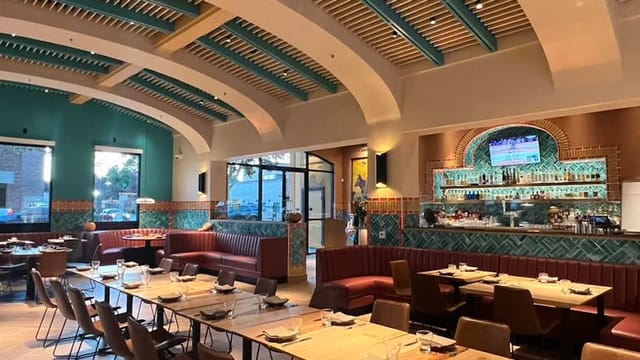 Willow Room at Copita: modern event space with natural light, ideal for meetings and networking.