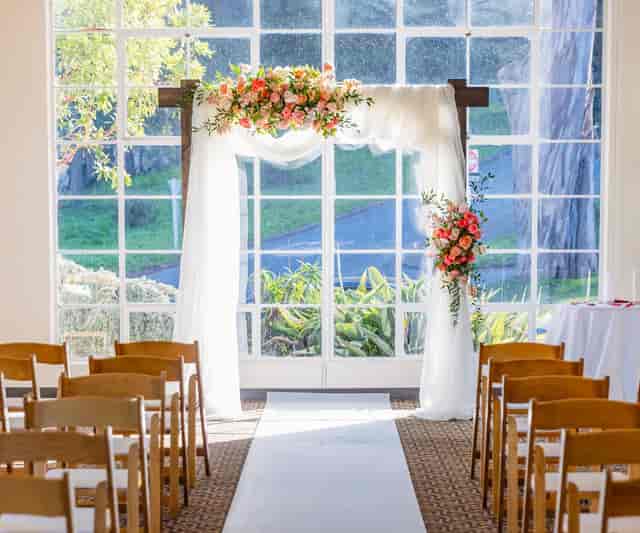 Hawthorn Ballroom wedding setup with elegant altar and vibrant flowers, perfect for ceremonies.