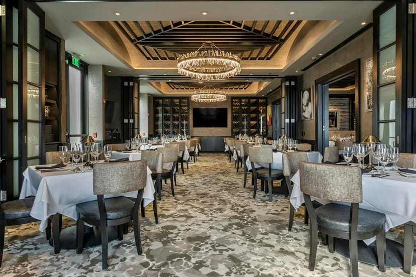 Elegant dining space at Mastro's for corporate events and private gatherings.