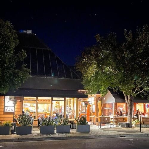 Sushi Ran restaurant exterior at night, cozy atmosphere for receptions and gatherings.