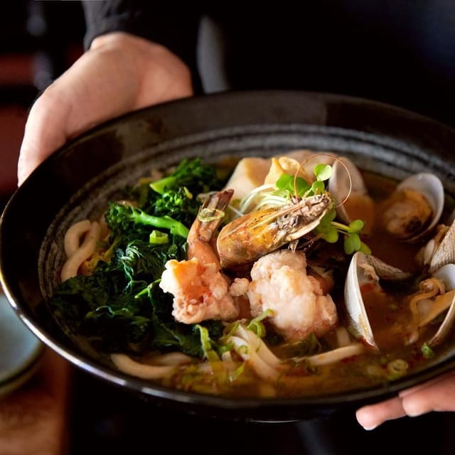 Vibrant seafood noodles dish at Sushi Ran, perfect for culinary events and gatherings.