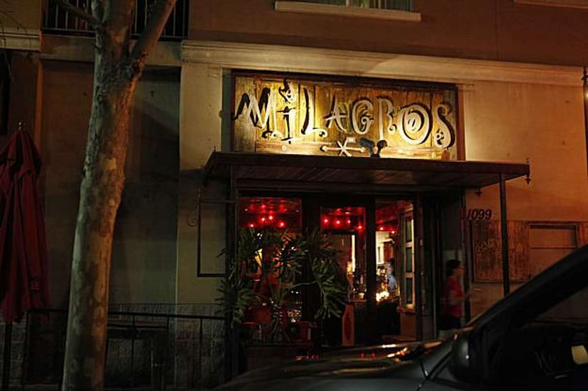 Tequila Bar at Milagros: vibrant venue with inviting facade for events and gatherings.