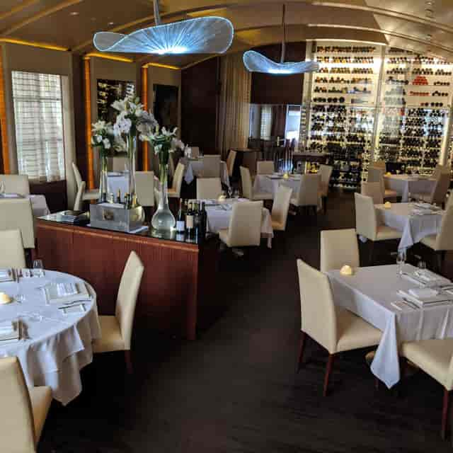 Main Dining Room at Plumed Horse: elegant setting for corporate events or intimate celebrations.