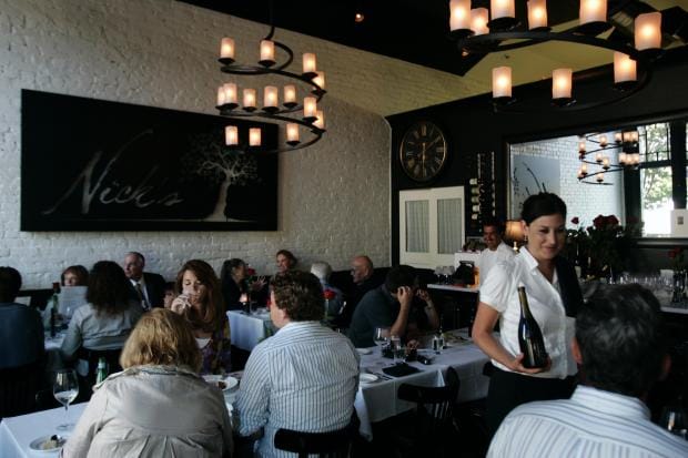 Chic restaurant setting with modern decor, perfect for intimate gatherings and corporate dinners.