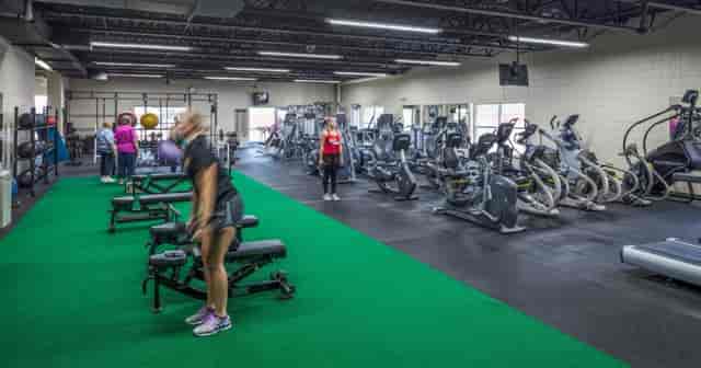 Well-equipped gym in Redwood Area Community Center for corporate wellness retreats.