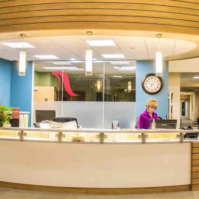 Modern front desk at Redwood Area Community Center for events and conferences.