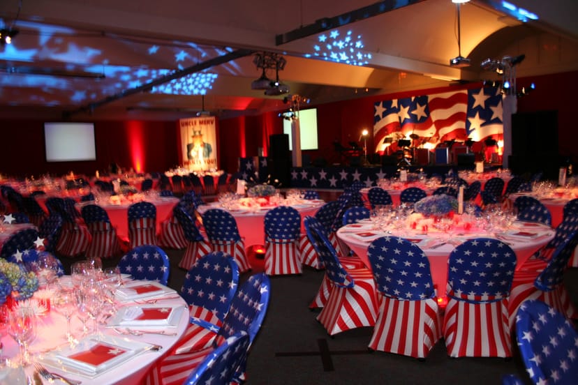 Cypress Hall event space with American flag tablecloths, ideal for patriotic gatherings.
