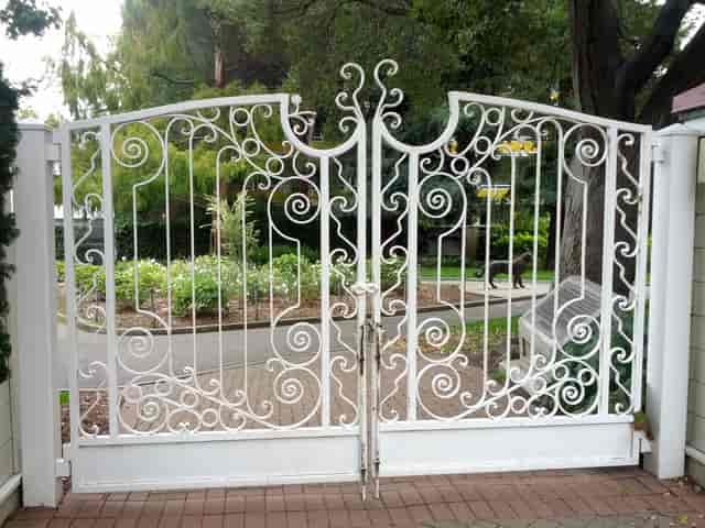 Elegant wrought iron gate at Kohl Pumphouse, perfect for outdoor receptions and ceremonies.
