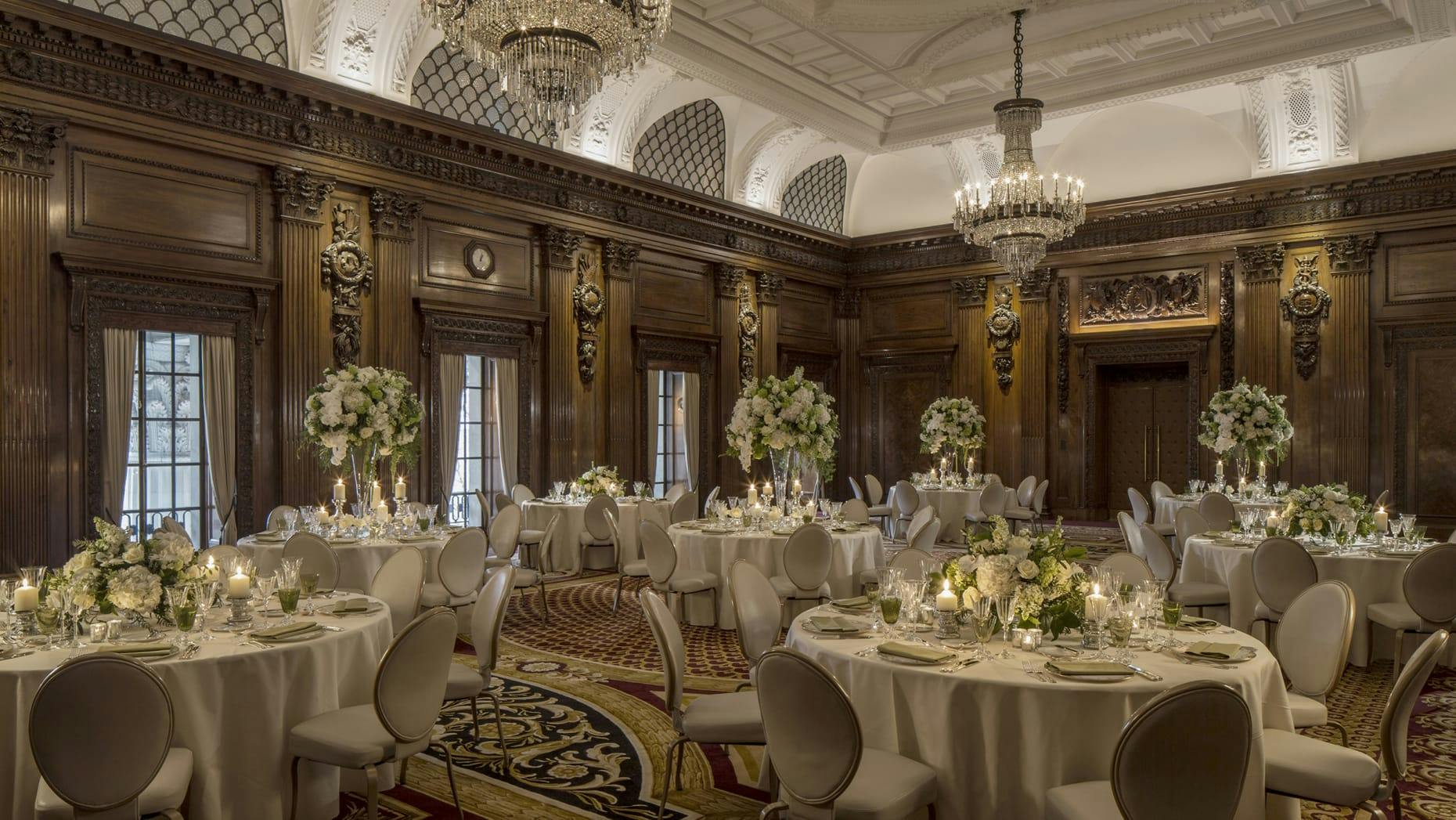 Elegant UN Ballroom with ornate chandeliers, ideal for weddings and corporate events.