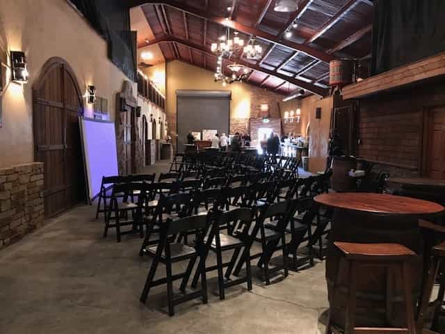Banquet hall at La Honda Winery with rustic decor for elegant events and gatherings.