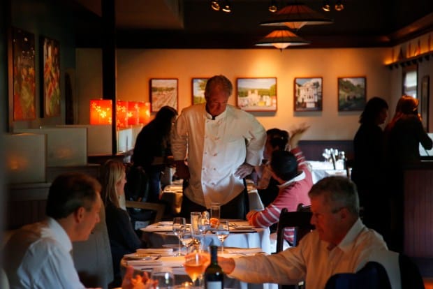 Elegant restaurant setting with warm lighting for intimate gatherings and corporate events.