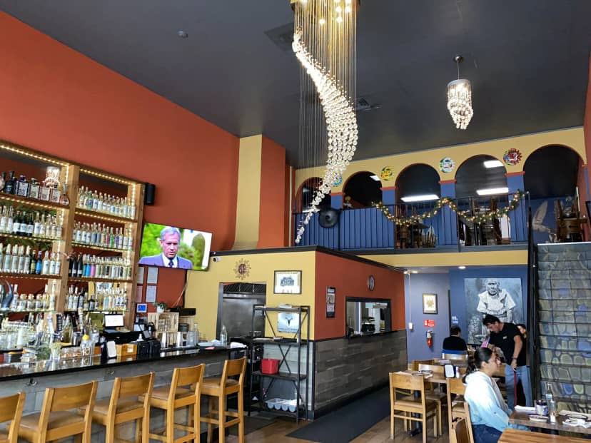 Vibrant La Fonda Restaurant bar with stylish decor, perfect for casual gatherings or events.