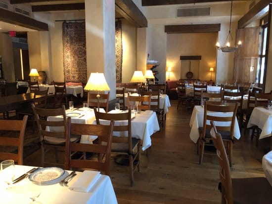 Charming Kokkari Estiatorio dining room ideal for intimate events and business dinners.