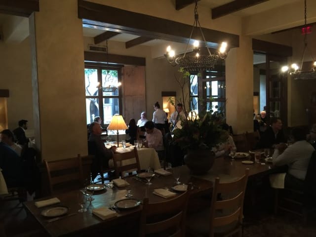 Cozy dining room at Kokkari Estiatorio, perfect for intimate corporate events.