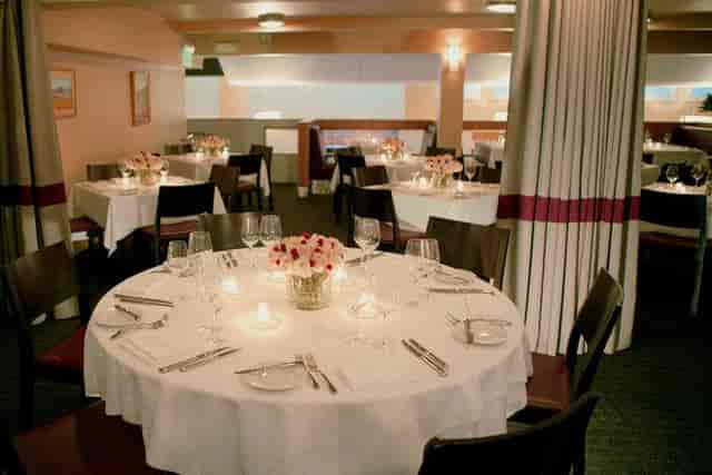 Elegant dining setup at Mezzanine in Perbacco for corporate events and special occasions.