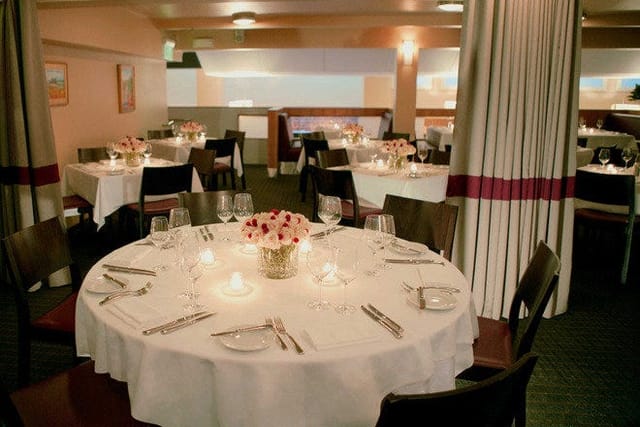 Elegant dining setup at Mezzanine in Perbacco for corporate events and special occasions.