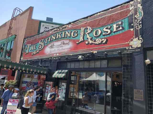Vibrant restaurant facade of The Stinking Rose, perfect for casual events and themed parties.
