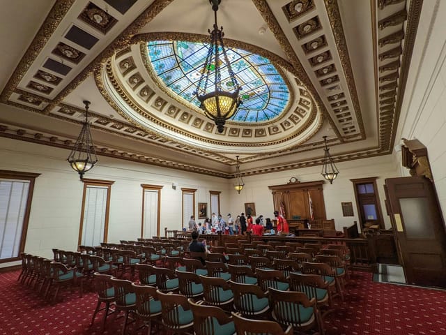 San Mateo County courtroom with stained glass ceiling for formal events and workshops.
