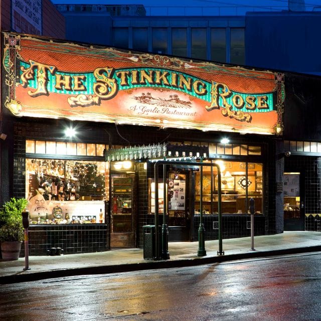 Vibrant restaurant façade of The Stinking Rose, ideal for private events and gatherings.