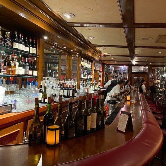 Dining Room bar at House of Prime Rib, elegant ambiance for events and networking.