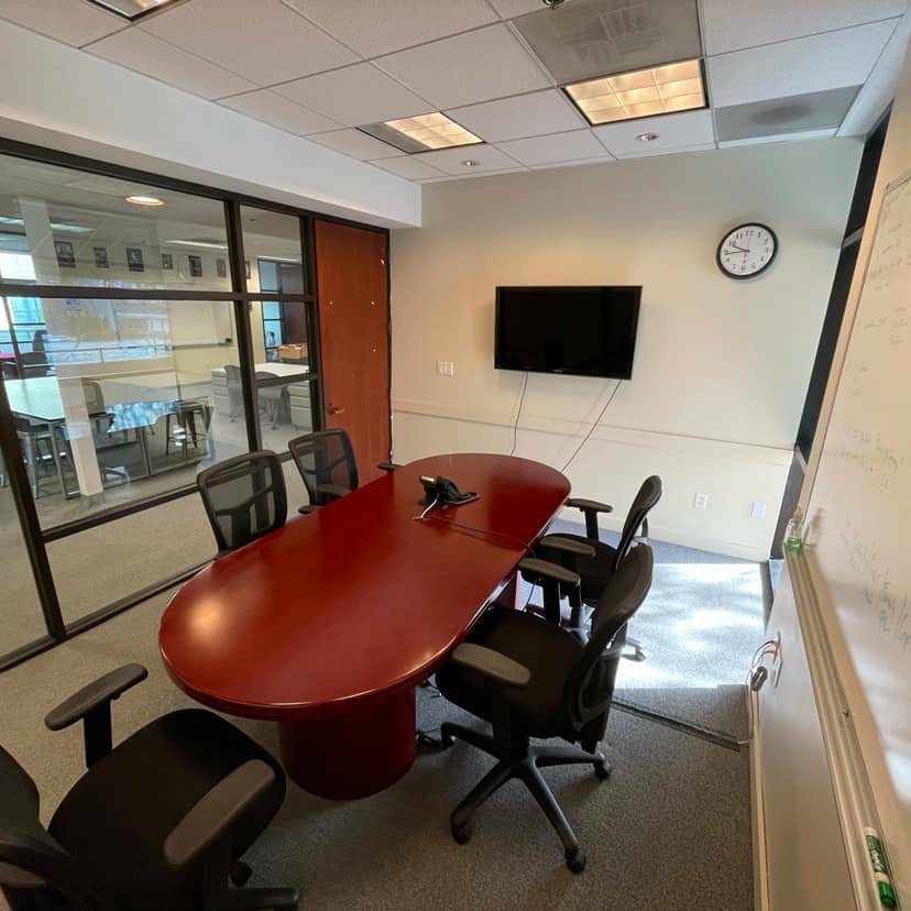 Menlo Park meeting room with oval table, ergonomic chairs for productive meetings