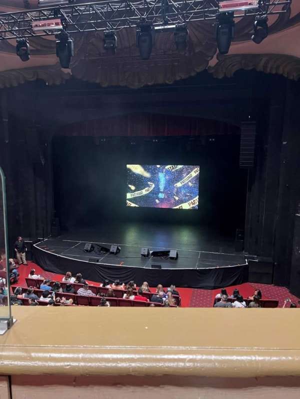Mezzanine stage setup with vibrant visuals for engaging events and meetings.