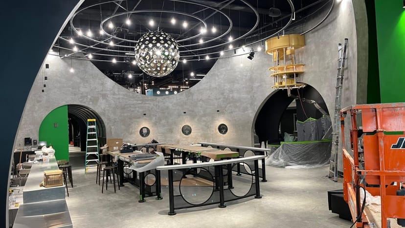 Modern event space with industrial design, perfect for meetings and upscale events.