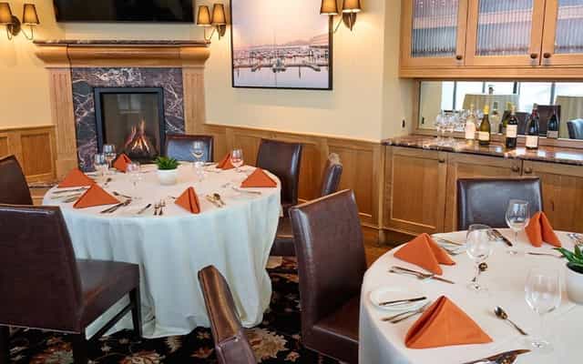 Elegant round table setting in Bistro Boudin’s Bakery Museum Room for intimate events.