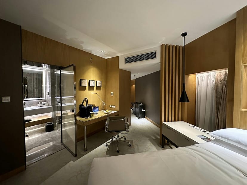 Modern hotel suite at Renaissance Beijing for business travelers, ideal for meetings.