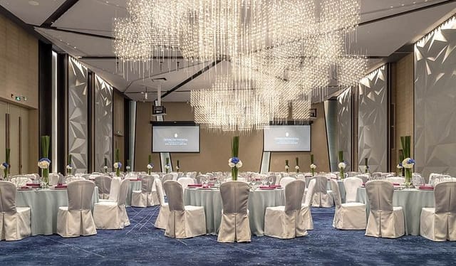 InterContinental Grand Ballroom Foyer with elegant chandeliers, ideal for corporate events.