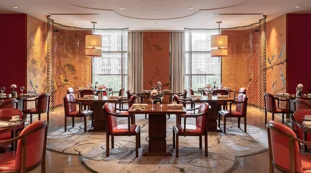 Elegant dining space at Grand Hotel Beijing, perfect for business meetings and upscale events.