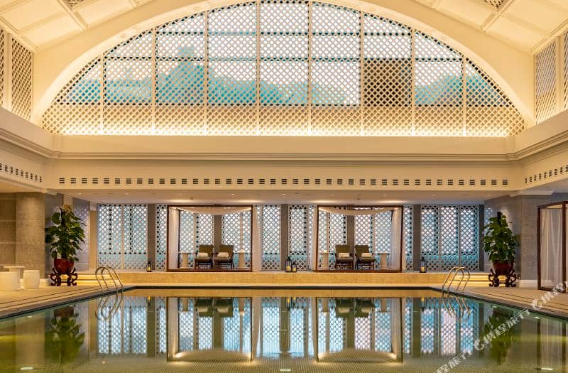 Elegant indoor pool at Grand Hotel Beijing, perfect for wellness retreats and upscale events.