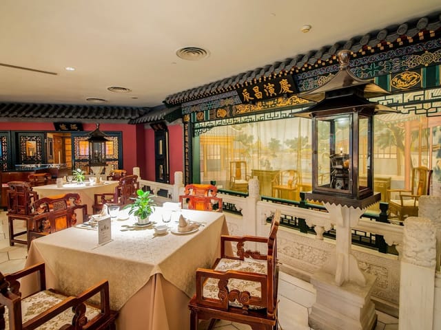 Elegant Xinyuan Hotel banquet hall, ideal for sophisticated corporate dinners and events.