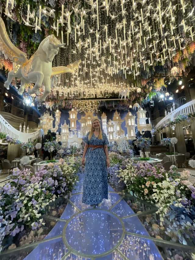Elegant wedding venue at Xinyuan Hotel with floral decor and whimsical lighting.