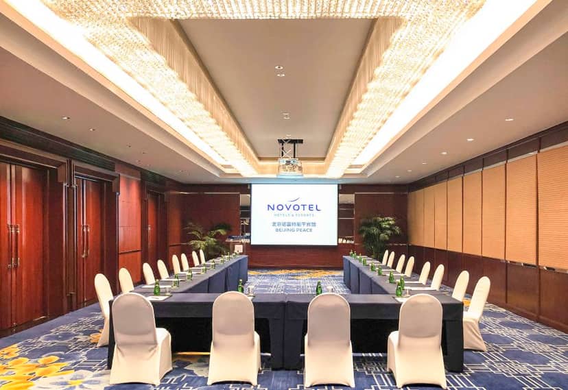 Meeting Room 11 at Novotel Beijing Peace, U-shaped seating for corporate events.