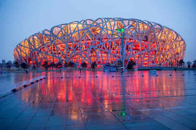 Stadium National Stadium with vibrant lighting for concerts and corporate events.