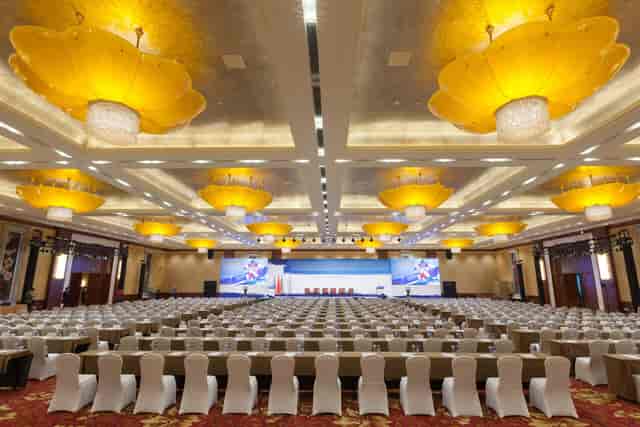 Golden Grand Hall at Beijing Hotel: spacious conference setup with elegant chairs, ideal for events.