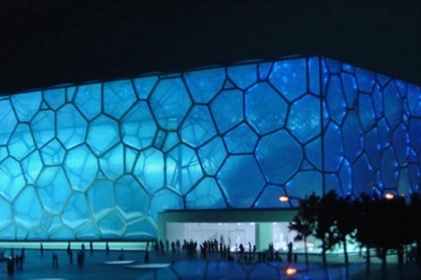 National Aquatics Centre with blue lighting, perfect for conferences and galas.