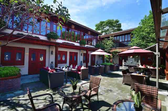 Outdoor venue at Jingshan Garden Hotel, ideal for events and meetings, with charming greenery.