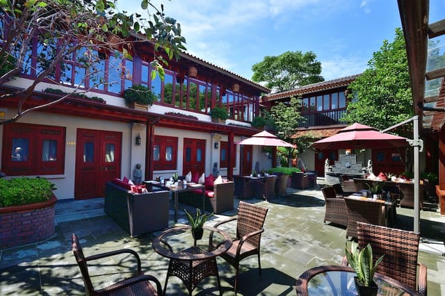 Outdoor venue at Jingshan Garden Hotel, ideal for events and meetings, with charming greenery.