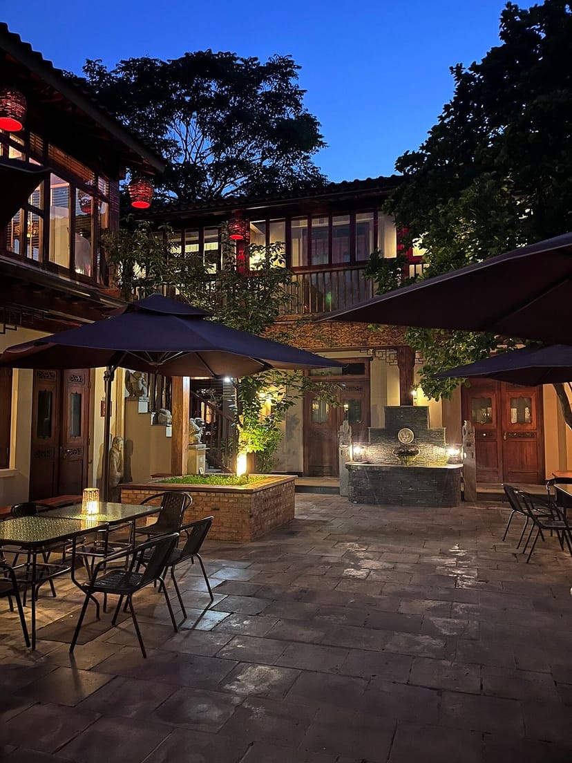 Charming courtyard at Jingshan Garden Hotel, ideal for outdoor events and gatherings.
