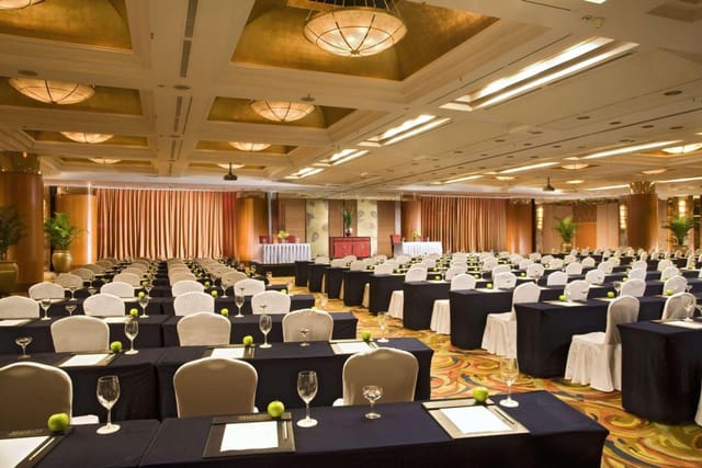 Banquet Hall at Swissôtel Beijing, elegant conference setup with natural light, event venue.