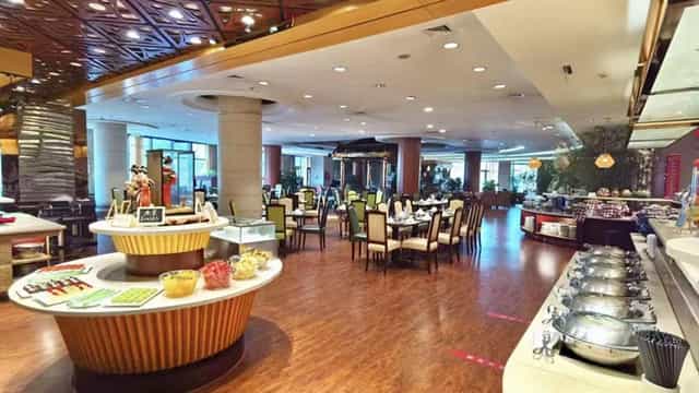 Spacious suites at Yuyang Hotel Beijing for meetings and social events, featuring modern decor.