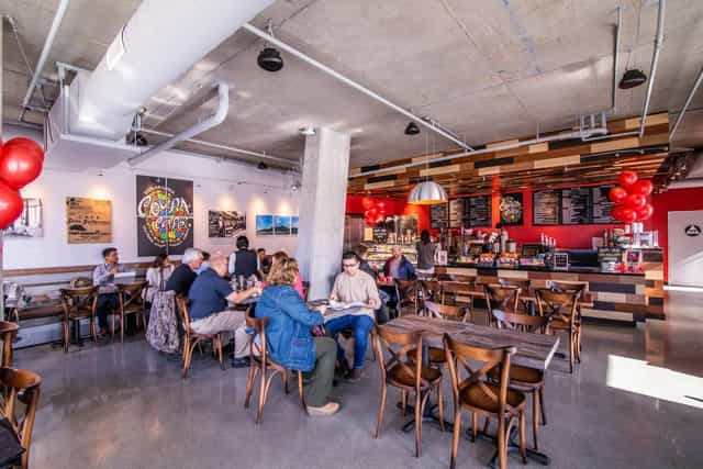 "Stanford Huang in Coupa Cafe: modern space with natural light for meetings and events."