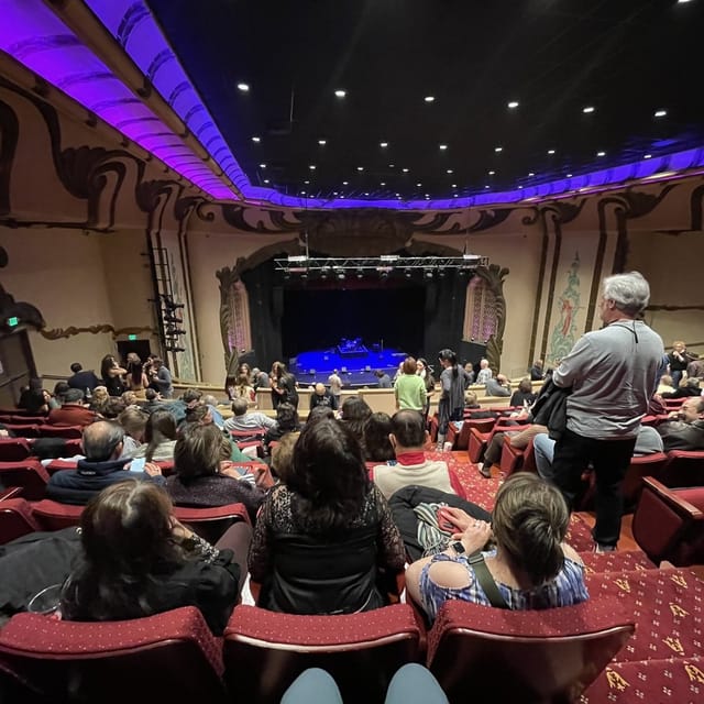 Main Stage at Dragon Theatre with elegant architecture, perfect for vibrant events and performances.