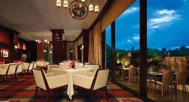 Private dining room at AMUZ Restaurant with elegant decor for exclusive events.