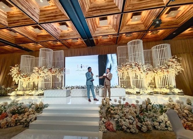 Edelweiss Ballroom at The Gaia Hotel for elegant corporate events with floral decor.