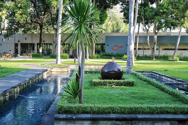 Serene garden venue at Cuca Restaurant, ideal for corporate retreats and events.